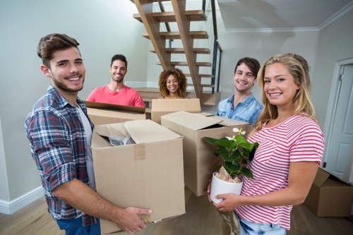 Boxes and furniture being loaded for Shoreditch self storage pricing example