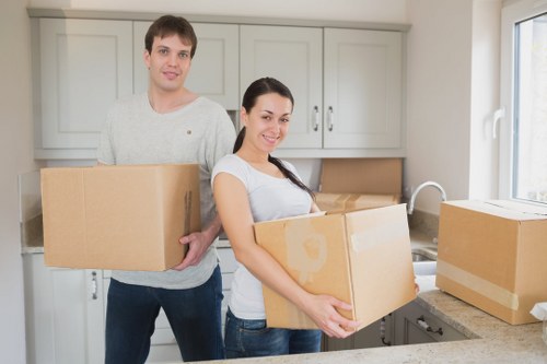 Furniture being moved from a flat with narrow stair access